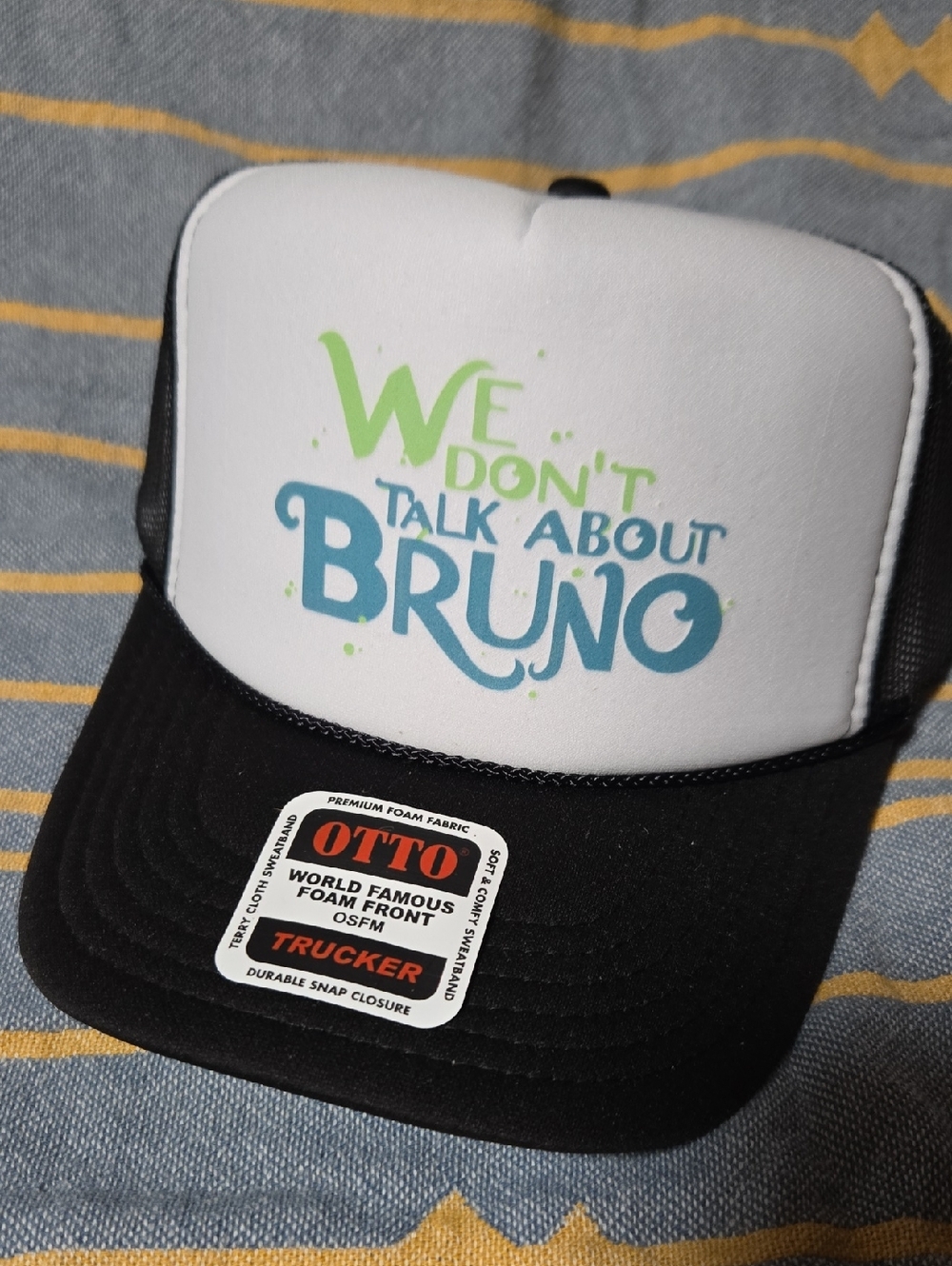 We Dont Talk About Bruno Trucker Hat